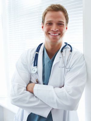 Closeup portrait of a happy young doctor