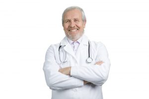Happy smiling doctor with arms folded 300x200