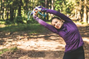 active young woman completing a run 300x200