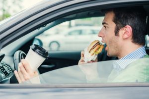 lazy man eating junk food 300x200