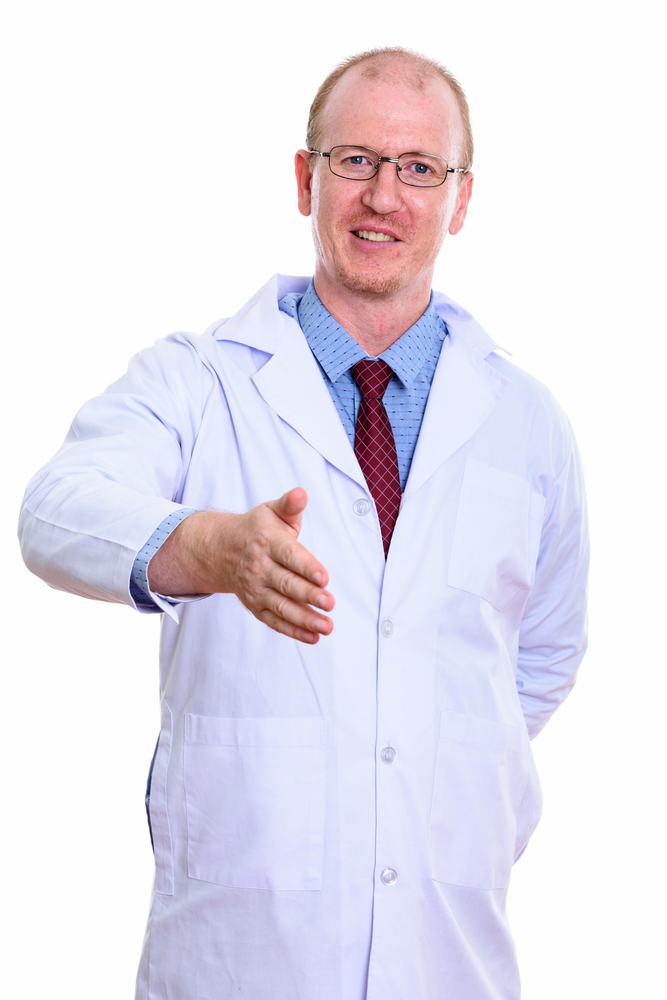 happy doctor prepared to shake hands