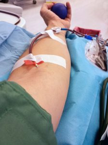 adult man s arm during the blood donation to the hospital 228763519 224x300