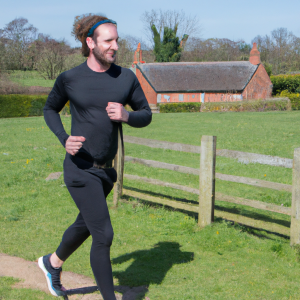 a professional appealing image of a caucasian man or woman jogging on a sunny day 275 300x300