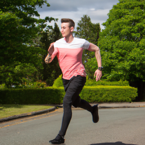a professional appealing image of a caucasian man or woman jogging on a sunny day