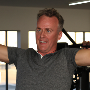 a professional appealing good looking and atheletic image of a caucasian man exercising in a gym 900 300x300