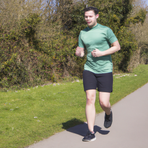 a professional appealing image of a caucasian man or woman jogging on a sunny day 295 300x300